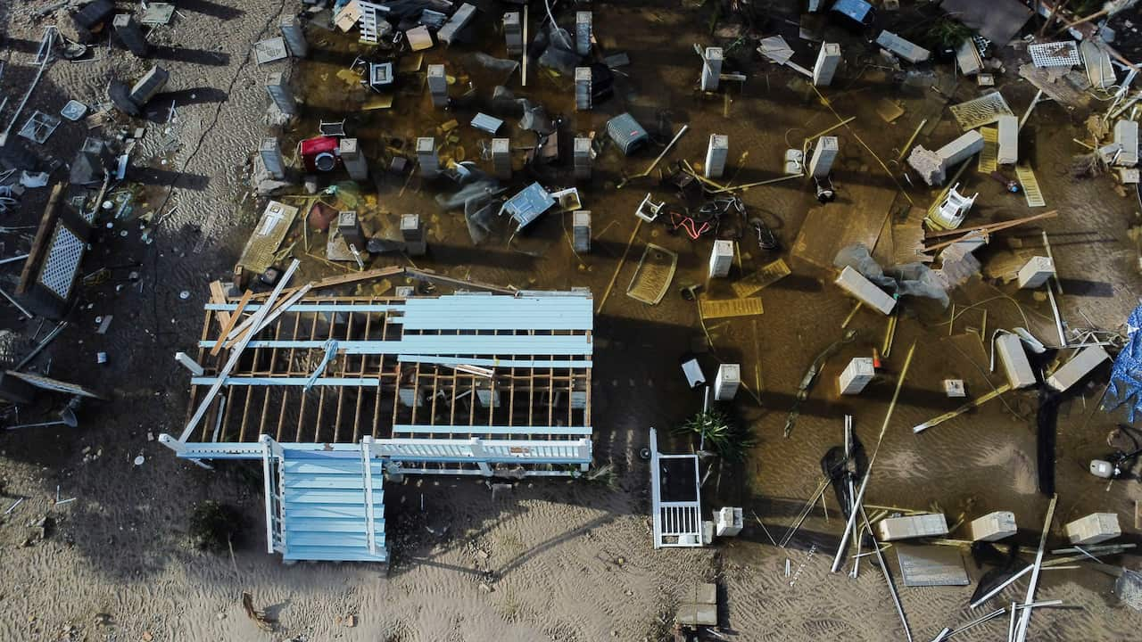 An aerial view of buildings destroyed by a storm surge from a hurricane. 