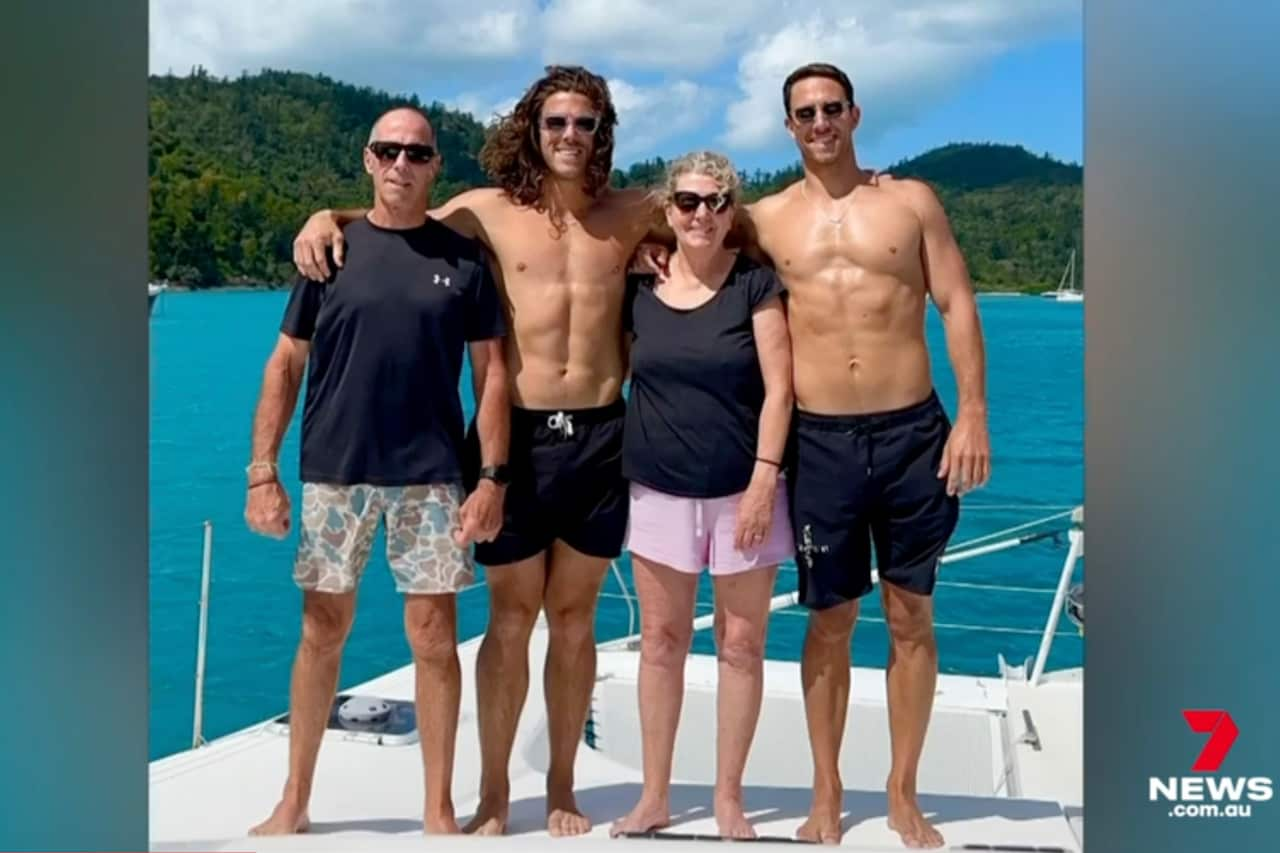 Photo of a family on a boat.