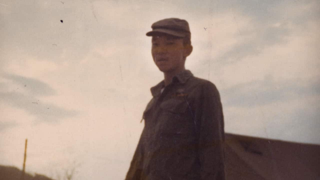 Bruce Nakashima in a grey uniform