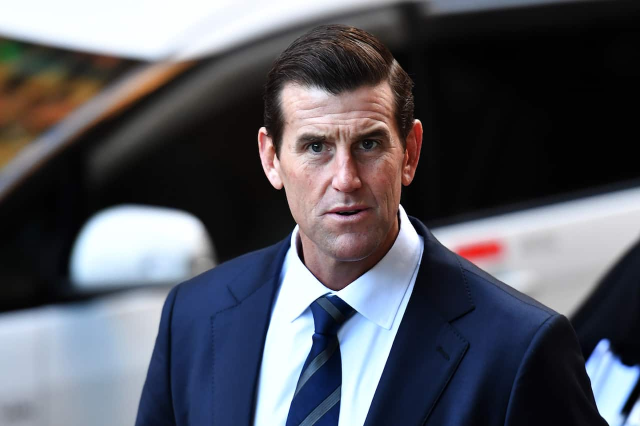 Ben Roberts-Smith wearing a dark suit and tie